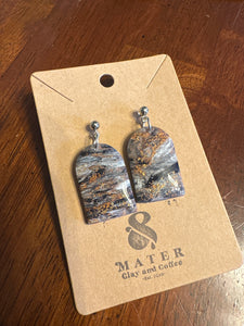 Silver blue and gold swirls with silver ball posts
