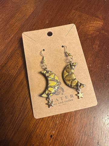 Black moons with gold leaf