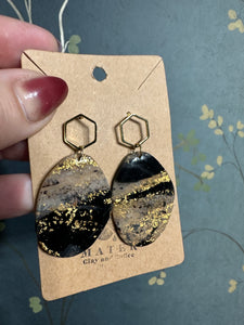 Black dangles with gold hexagon post