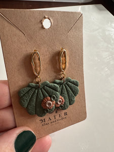 Green scalloped dangles with flowers